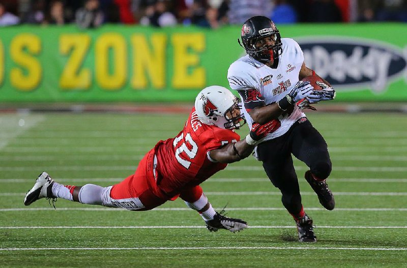 Arkansas State running back Michael Gordon (right) scored five touchdowns in a 44-28 victory over Idaho last season and is hoping for another big performance tonight against the Vandals.