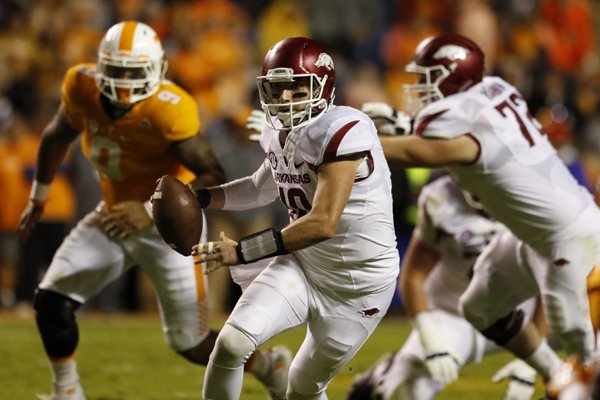 Arkansas quarterback Brandon Allen (10) looks for an open player during the second quarter of the Tennessee game Saturday, Oct. 3, 2015, in Knoxville, Tennessee.