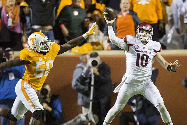 Arkansas quarterback Brandon Allen passes during the second quarter of a game against Tennessee on Saturday, Oct. 3, 2015, at Neyland Stadium in Knoxville, Tenn. 