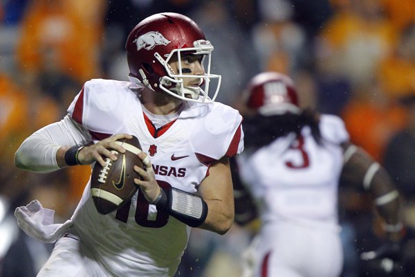 Arkansas quarterback Brandon Allen (10) looks for a receiver during the first half of an NCAA college football game against Tennessee Saturday, Oct. 3, 2015, in Knoxville, Tenn. (AP Photo/Wade Payne)