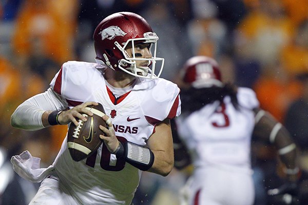 Arkansas quarterback Brandon Allen (10) looks for a receiver during the first half of an NCAA college football game against Tennessee Saturday, Oct. 3, 2015, in Knoxville, Tenn. (AP Photo/Wade Payne)