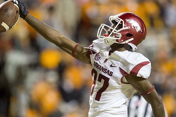 Arkansas receiver Dominique Reed celebrates after scoring a touchdown during the second quarter of a game against Tennessee on Saturday, Oct. 3, 2015, at Neyland Stadium in Knoxville, Tenn. 