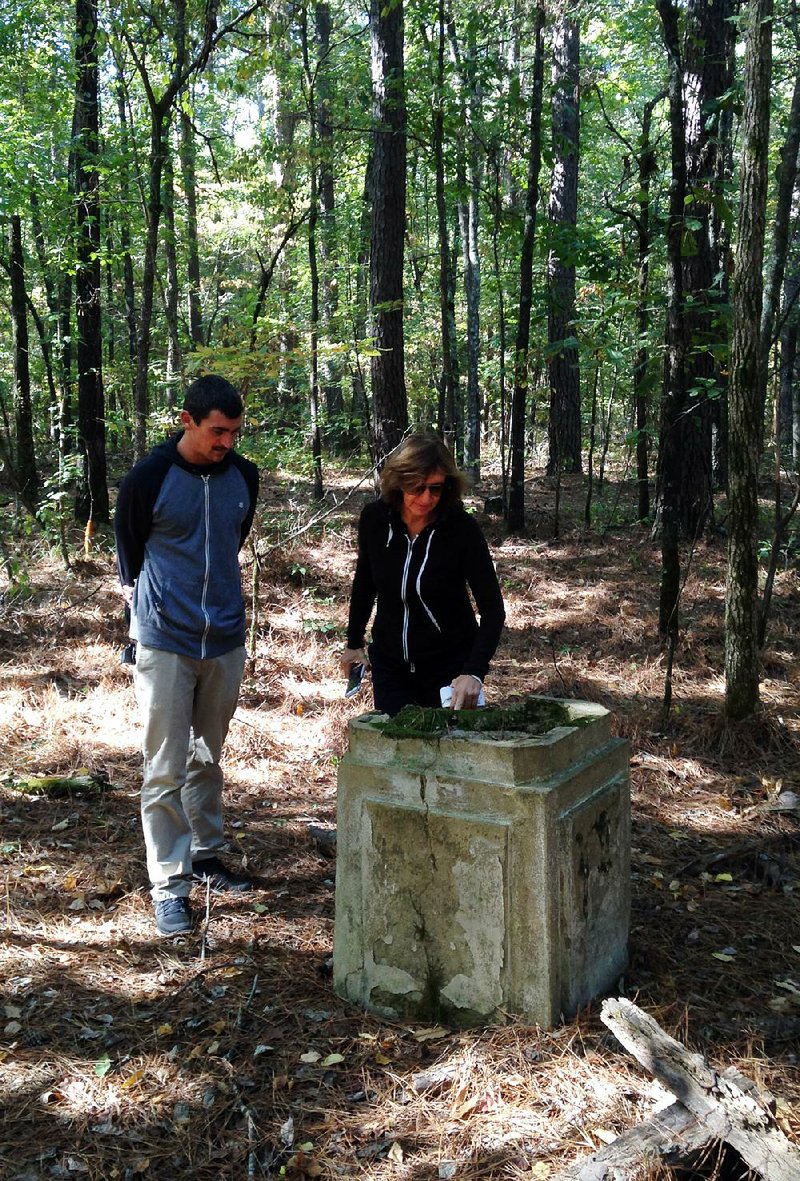 Matteo Borgardt and Silvia Bizio check out the remains of a chapel that was built by prisoners of war at the former Camp Monticello during World War II. 