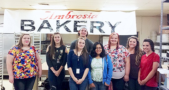 Submitted photo Amanda Porter's Lake Hamilton High School food production students recently visited Ambrosia Bakery to tour the facility and learn from the owner, Millie Baron. Students ate lunch at Copeland's New Orleans restaurant and spoke to the manager about the business. Students, from left, who traveled were Kelli Paris, Ciara Wood, Alta Nitchol, Nathan Dutton, Esmeralda Martinez, Madison Campbell, Ashlee Burgess and Jasmin Dotson.