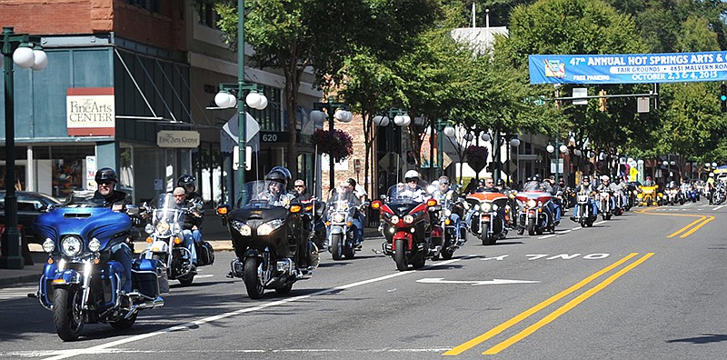 The Sentinel-Record/Mara Kuhn Motorcyclists make their way down Central Avenue from Little Rock to the Veterans Memorial of Garland County on Saturday. Arkansas Honor Ride is a motorcycle group that raises money for injured military members and their families at the Brooke Army Medical Center in San Antonio.
