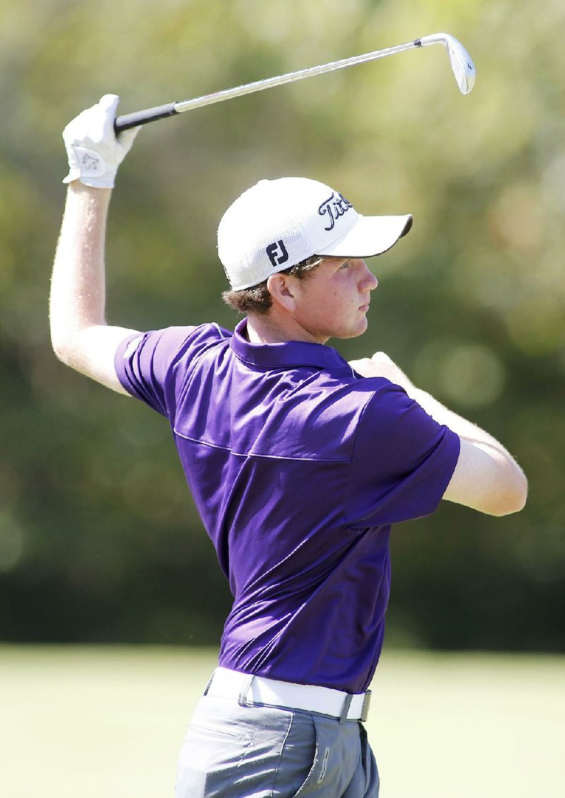 Fayetteville senior Luke Long shot a 1-over par 71 during the first round of the Class 7A boys state championship golf tournament Tuesday in Fayetteville. 