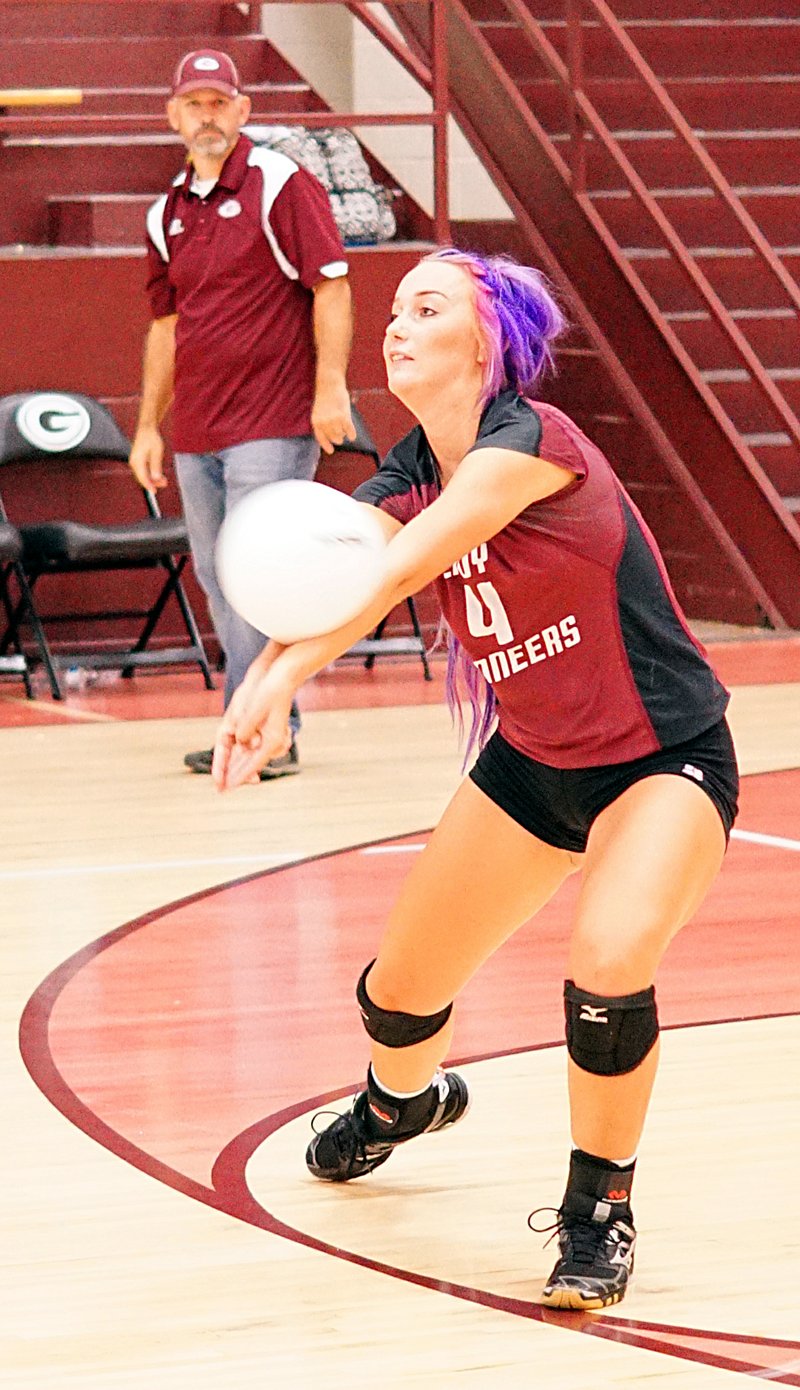 Photo by Randy Moll Dakota Webb, Gentry senior, receives a serve during play against Huntsville in Gentry on Thursday, Oct. 1, 2015.