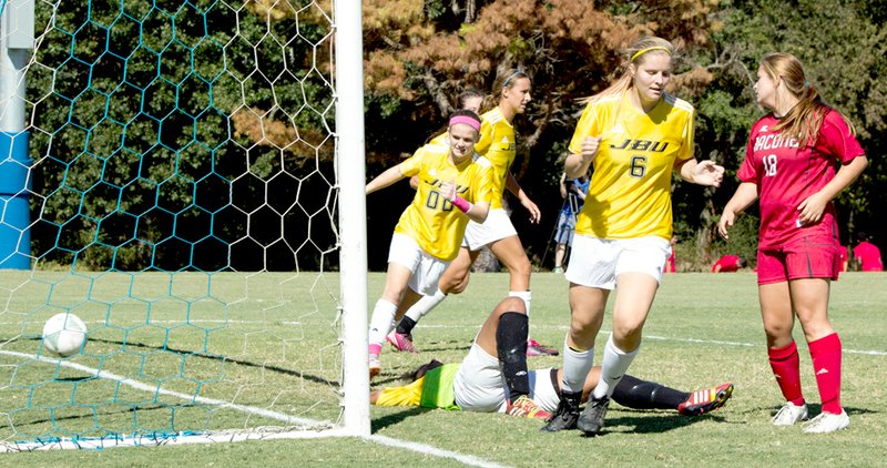 Photo courtesy of JBU Sports Information John Brown junior Sara Lachance, No. 6, reacts after scoring a goal in JBU&#8217;s 8-0 win Saturday against Bacone.