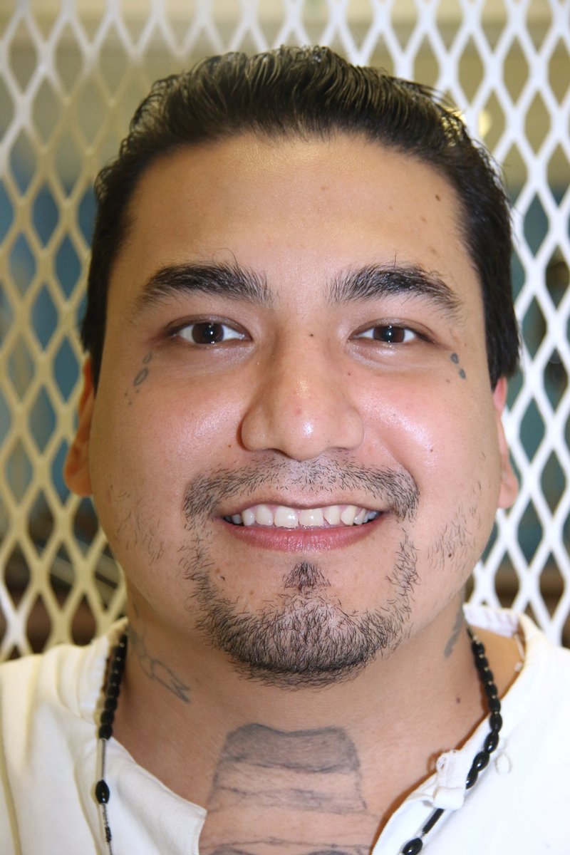 Death row inmate Juan Garcia is photographed in a visiting cage Wednesday, Sept. 2, 2015, at the Texas Department of Criminal Justice Polunsky Unit near Livingston, Texas. 