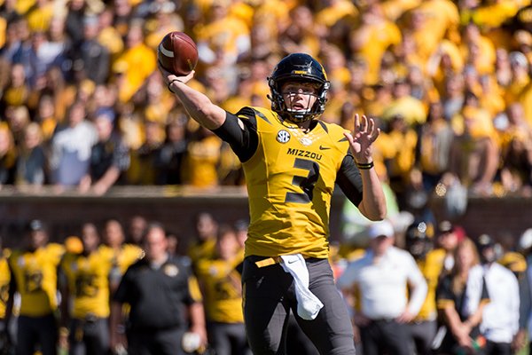 Missouri quarterback Drew Lock throws a pass during the third quarter of an NCAA college football game against South Carolina Saturday, Oct. 3, 2015, in Columbia, Mo. (AP Photo/L.G. Patterson)