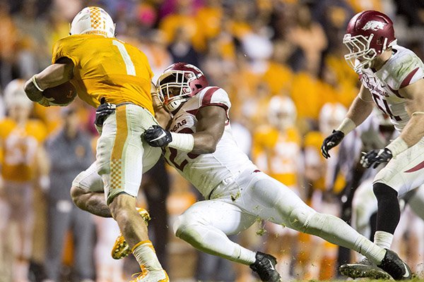 Arkansas freshman linebacker Dre Greenlaw makes a stop on Tennessee sophomore running back Jalen Hurd on Saturday, Oct. 3, 2015, against Tennessee at Neyland Stadium in Knoxville, Tenn.