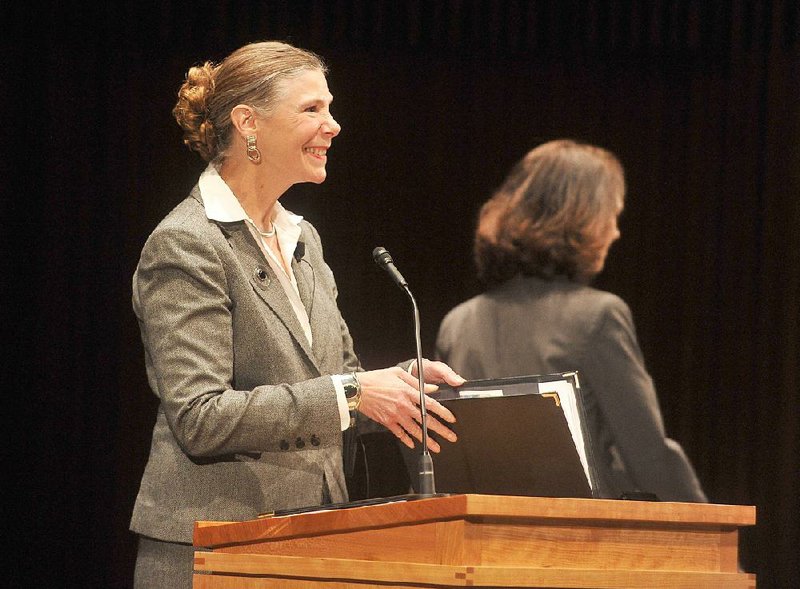 April Mason, provost and senior vice president of Kansas State University, speaks during a public forum Wednesday at the Faulkner Performing Arts Center on the University of Arkansas at Fayetteville campus. Mason was the first of three finalists for the UA chancellor position to visit the school. 