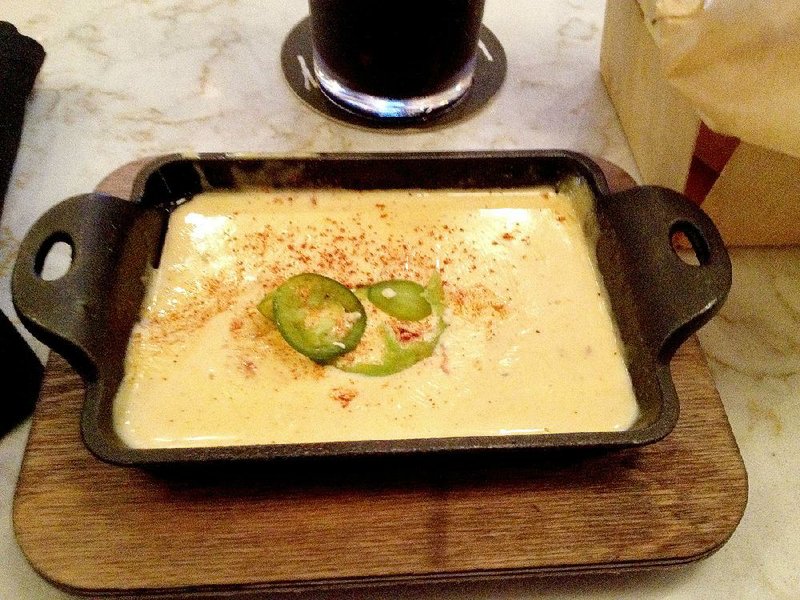 Melting Pot Cheese Dip at Heights Taco & Tamale 