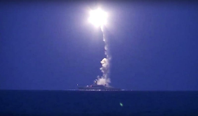 A Russian navy vessel in the Caspian Sea launches a cruise missile toward a target inside Syria on Wednesday in this image taken from footage on the Russian Defense Ministry website. 