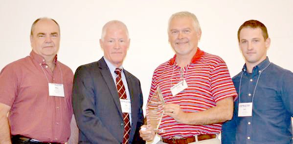 Photo submitted U.S. Poultry&#8217;s 2015 Clean Water Awards were presented at this year&#8217;s Environmental Management Seminar in Destin, Fla. The winner in the full treatment category was Simmons Foods of Southwest City, Mo., with, from left, Mike Davis, director of engineering and environmental operations; Andy Brashear, area environmental manager; and Seth Walters, director of environmental quality, accepting the award from Paul Bredwell, second from left, vice president of environmental programs for U.S. Poultry.