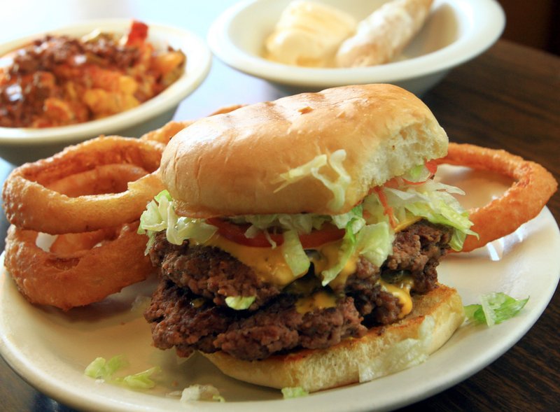 FILE — Double Cheeseburger with onion rings from Burger Mama's when it was located at 7710 Cantrell Road in 2012.