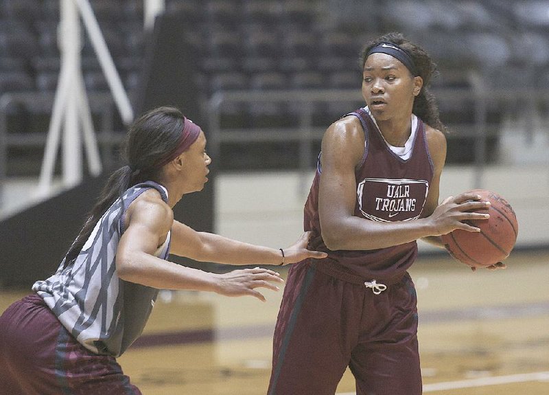 UALR forward Shanity James (right) is one of two returning starters for the Trojans, who went 29-5 a year ago and lost to Arizona State in the second round of the NCAA Tournament. 