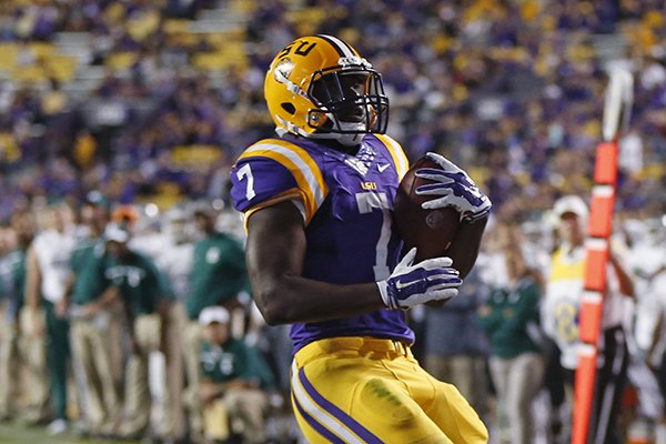 LSU running back Leonard Fournette (7) carries for a touchdown in the second half of an NCAA college football game against Eastern Michigan in Baton Rouge, La., Saturday, Oct. 3, 2015. LSU won 44-22. (AP Photo/Gerald Herbert)