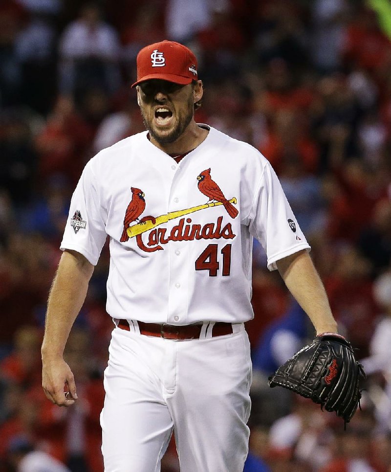 St. Louis pitcher John Lackey gave up only 2 hits while striking out 5 in 7 1/3 innings to lead the Cardinals to a 4-0 victory over the Chicago Cubs in Game 1 of the National League division series Friday at Busch Stadium in St. Louis.