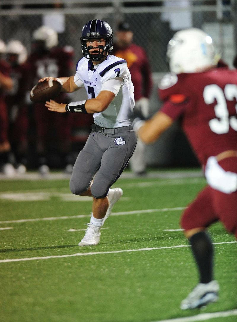 Fayetteville quarterback Taylor Powell was 20 of 22 for 238 yards and 3 touchdowns during Friday night’s victory over Springdale.