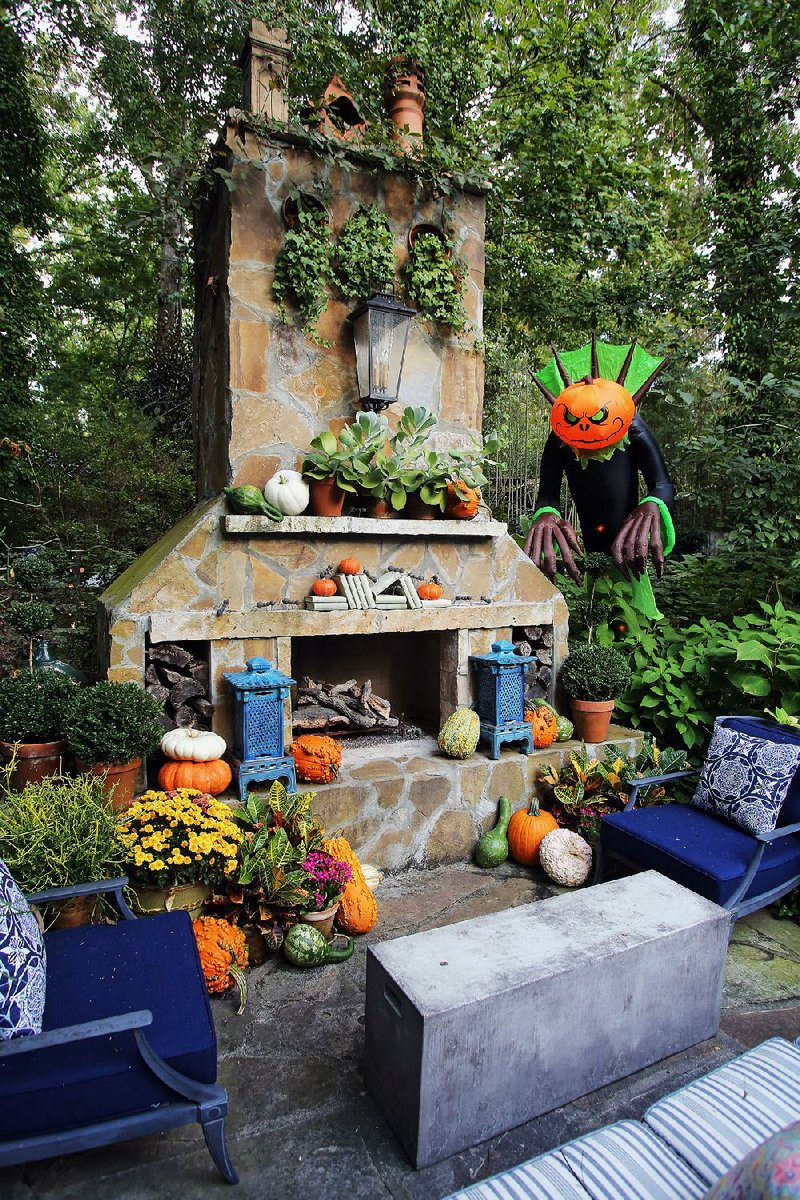 A touch of Halloween livens up the fall decor in the yard of Little Rock-based home and garden expert Chris H. Olsen. “I do it for the kid in me,” he says. “And then I share it with the people in the neighborhood, because it’s more fun.”