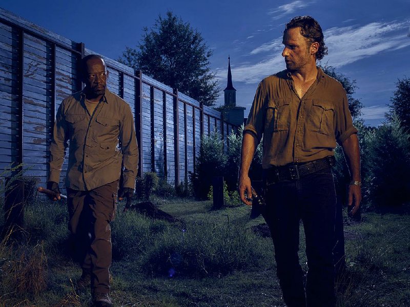 The Walking Dead returns at 8 p.m. today on AMC and features Lennie James (left) as Morgan Jones and Andrew Lincoln as Rick Grimes.
