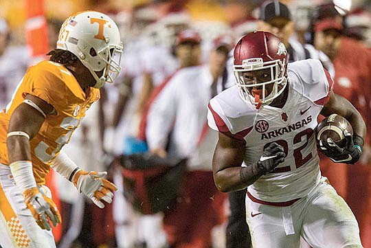 NWA Democrat-Gazette/Jason Ivester RUNNING RAZORBACKS: Arkansas running back Rawleigh Williams III (22) carries against Tennessee defensive back LaDarrell McNeil last week at Neyland Stadium in Knoxville, Tenn. Williams and Alex Collins each rushed for 100-plus yards against the Volunteers, trying to breach No. 8 Alabama's defense at 6 p.m. today in Tuscaloosa, Ala., on ESPN (Resort Channel 30).