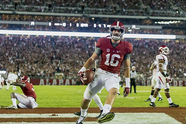 Alabama wide receiver Richard Mullaney (16) celebrates his touchdown pass during the second half of an NCAA college football game against Arkansas Saturday, Oct. 10, 2015, in Tuscaloosa, Ala. (Vasha Hunt/AL.com via AP) 