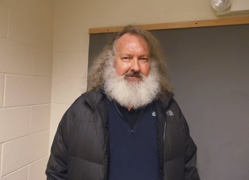 In a photo provided by the Vermont State Police, actor Randy Quaid stands in the Vermont State Police barracks in St. Albans, Vt., Friday, Oct. 9, 2015. State Police say Quaid has been taken into custody while trying to cross from Canada into the United States. State Police say the "Independence Day" actor was detained by troopers at the Highgate Springs port of entry, days after Canadian officials said he would be deported. Quaid is wanted in Santa Barbara, Calif., to face felony vandalism charges filed in 2010 after he and his wife, Evi, were found squatting in a guesthouse of a home they previously owned. 