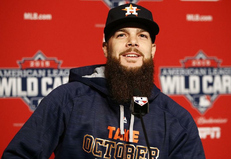 Houston Astros starting pitcher Dallas Keuchel speaks during a press conference on workout day Monday, Oct. 5, 2015. 