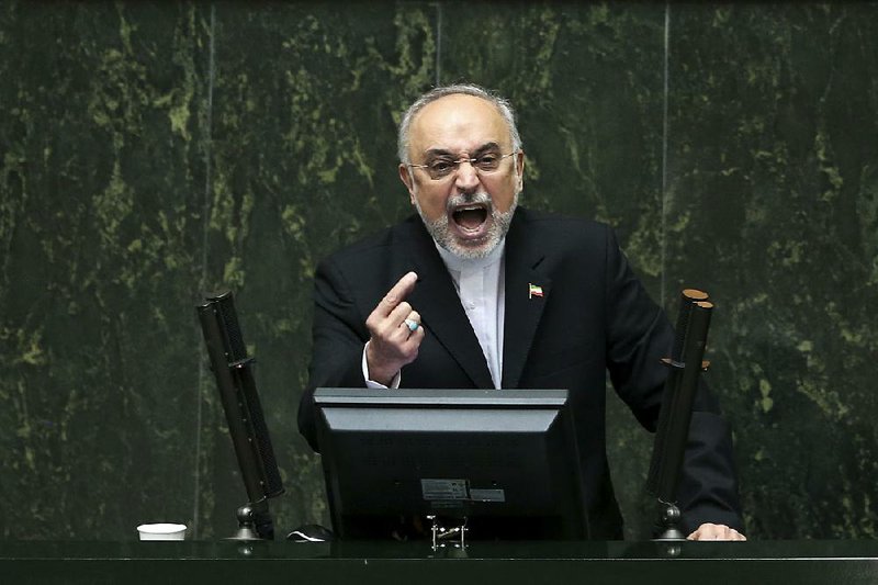 Ali Akbar Salehi, the head of Iran’s Atomic Energy Organization, speaks in an open session of the Iranian parliament in Tehran on Sunday while discussing a bill on Iran’s nuclear deal with world powers.