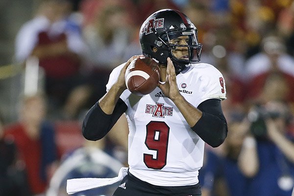 Arkansas State quarterback Fredi Knighten throws the ball against Southern California during the first half of an NCAA college football game, Saturday, Sept. 5, 2015, in Los Angeles. (AP Photo/Danny Moloshok)