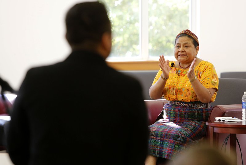 Nobel Peace Prize winner Rigoberta Menchu speaks Tuesday in the Helen Robson Walton Reading Room at Mullins Library on the campus of the University of Arkansas in Fayetteville.
