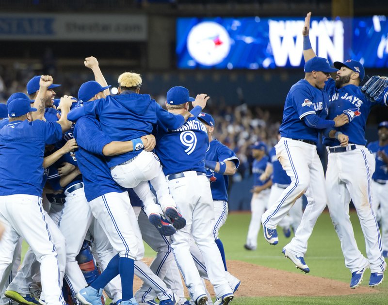 The Toronto Blue Jays bats celebrate following a 1993 World Series