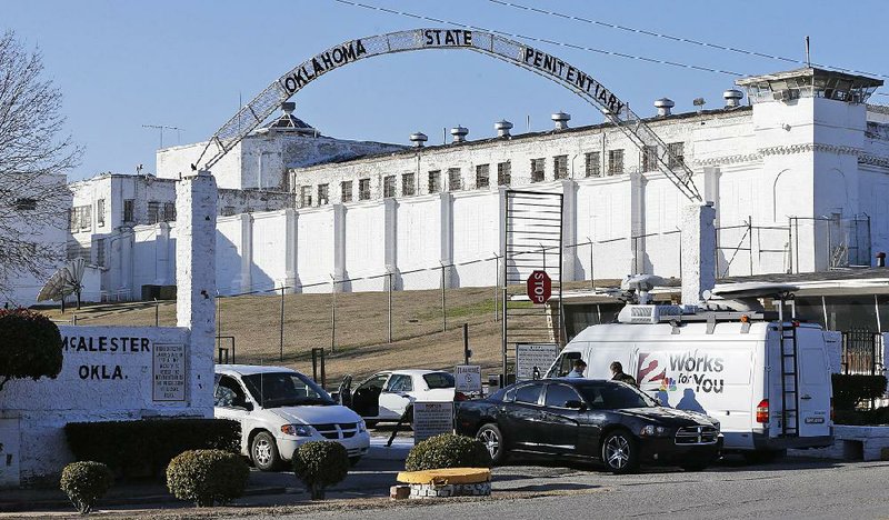 A news van arrives at the front gate of the Oklahoma State Penitentiary on Jan. 15 for the scheduled execution of Charles Warner in McAlester, Okla. Oklahoma’s attorney general has agreed to not request execution dates until 2016 as his office investigates why the state used the wrong drug to execute Warner, according to court documents filed Friday.
