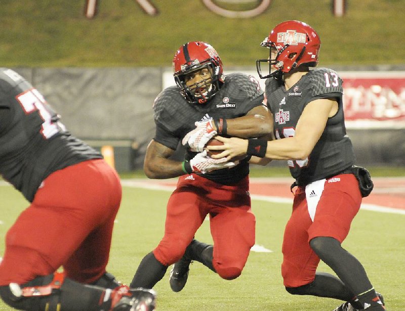 Arkansas State running back Michael Gordon (center), who is fifth in the Sun Belt in rushing, should be able to play Tuesday night against Louisiana-Lafayette after sitting out most of the second half with a knee injury in last week’s victory against South Alabama.
