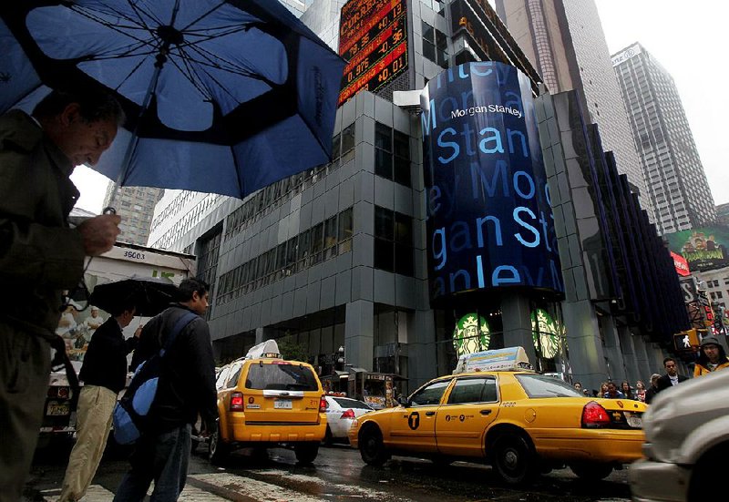 People pass Morgan Stanley’s headquarters in New York in this file photo.