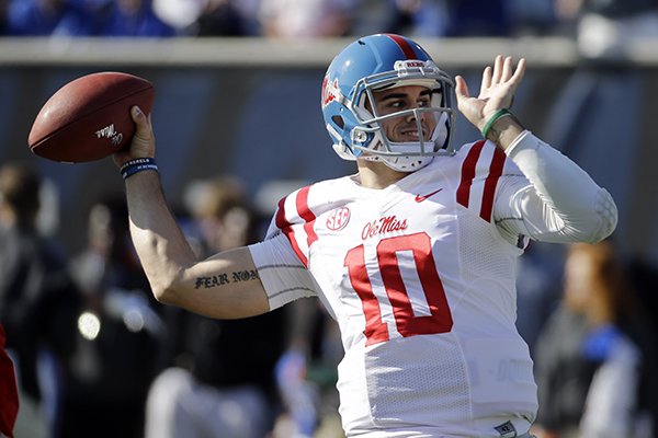 Mississippi quarterback Chad Kelly warms up before the start of an NCAA college football game against Memphis Saturday, Oct. 17, 2015, in Memphis, Tenn. (AP Photo/Mark Humphrey)