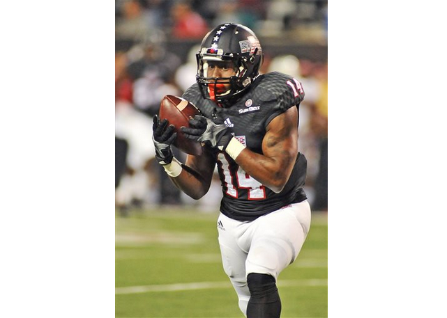 Arkansas State wide receiver Chris Murray catches a pass from Fredi Knighten to score a touchdown during the game against Louisiana-Lafayette on Tuesday, Oct. 20, 2015, in Jonesboro. 