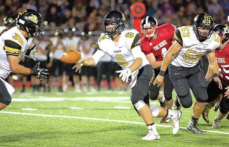 Photograph by David Beach Special to The Times Sam Dodd of Prairie Grove pitches the ball Friday to Read Orr at Blackhawk Stadium in Pea Ridge.