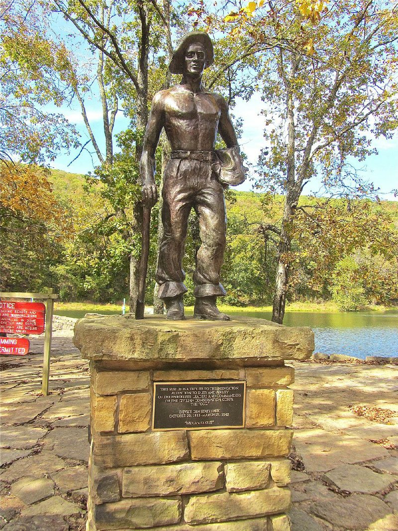 A bronze statue honors the Civilian Conservation Corps workers who labored to create Devil’s Den State Park starting in 1933. 