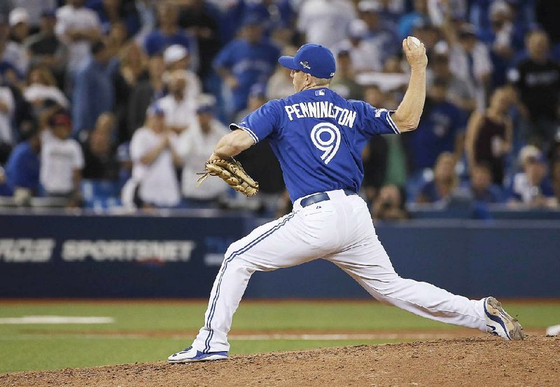 Toronto Blue Jays second baseman Cliff Pennington was called on to pitch in the ninth inning of Toronto’s 12-2 loss to Kansas City in Game 4 of the American League Championship Series. Pennington became the first position player to pitch in a postseason game.