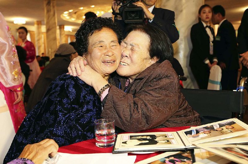 South Korean Jo Soon-jeon, 83, (right) hugs her North Korean sister Jo Kwi Nyo on Saturday during a reunion at North Korea’s Diamond Mountain resort.