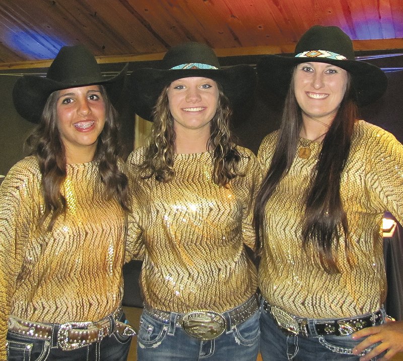 NWA Democrat-Gazette/LAURINDA JOENKS Rodeo of the Ozarks Rounders Hallie Toan, Bailey Perdue and Ashli Clary share smiles.