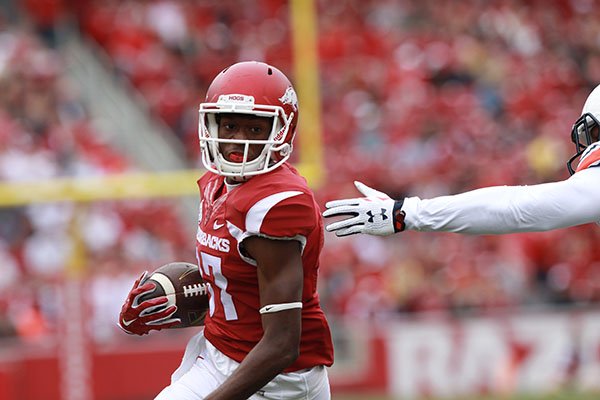 Arkansas receiver Dominique Reed runs for a touchdown during a game against Auburn on Saturday, Oct. 24, 2015, at Razorback Stadium in Fayetteville. 