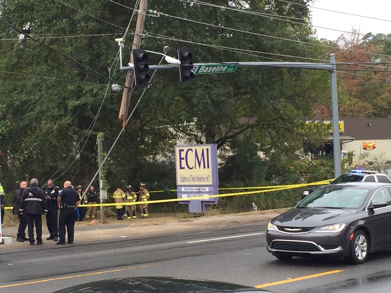 A fatal car wreck snapped a power pole Monday, Oct. 26, 2015, at Baseline and Stanton roads in southwest Little Rock.