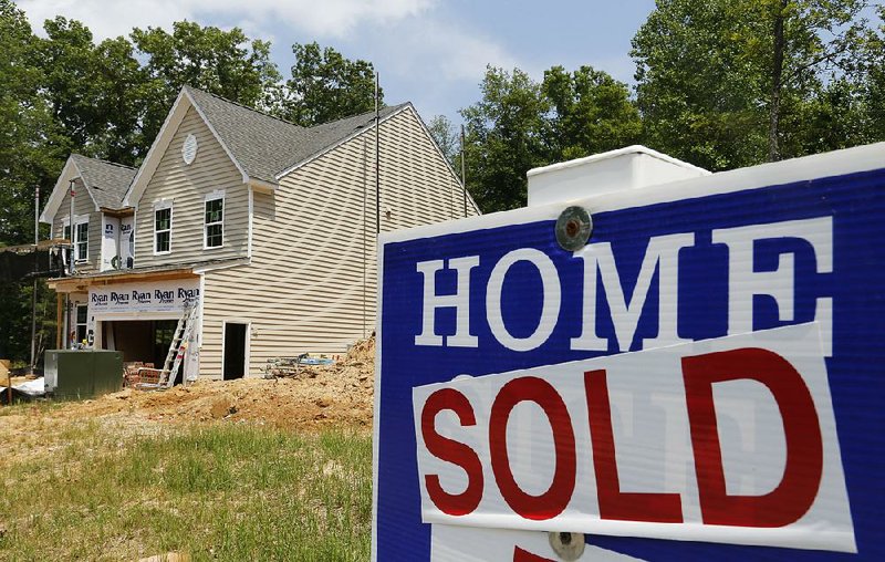 A new home nears completion in Mechanicsville, Va., in early June. Sales of new houses fell in September to the slowest pace in 10 months. 
