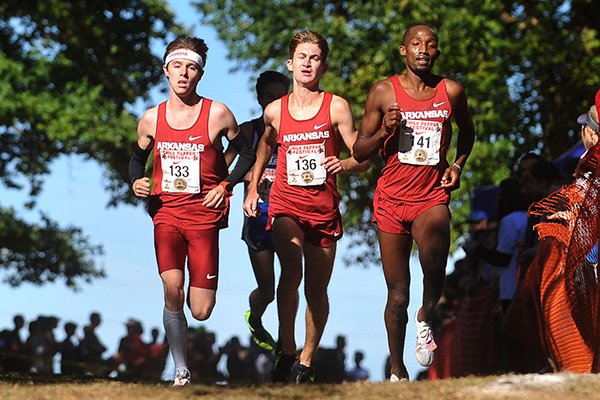 From left: Arkansas runners Alex George, Frankline Tonui and Christian Heymsfield compete during the Chile Pepper Cross Country Festival on Saturday, Oct. 3, 2015, in Fayetteville. 