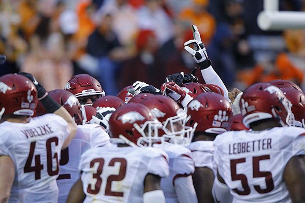 Arkansas players gather before the start of an NCAA college football game against Tennessee Saturday, Oct. 3, 2015 in Knoxville, Tenn. (AP Photo/Wade Payne)