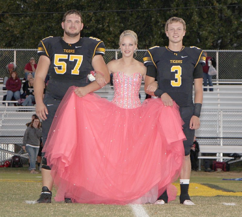 SHELLEY WILLIAMS/SPECIAL TO ENTERPRISE-LEADER Freshman maid Bekah Bostian, daughter of Keith and Elise Bostian, escorted by Gavin Heltemes, son of Mike and Heather Heltemes and Lee Heltemes, and Dakota Woods, son of Jackie Woods.